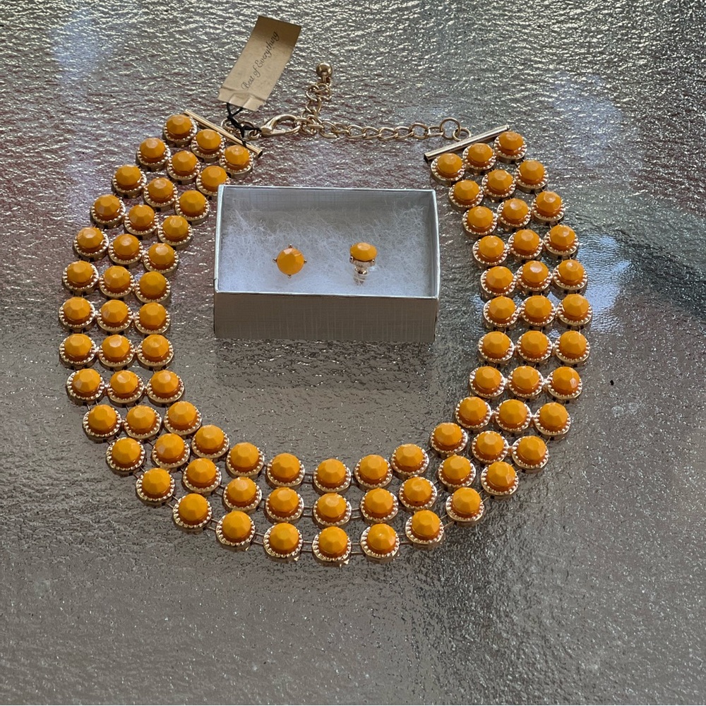 Yellow three row necklace with matching post earrings. Costume jewelry.